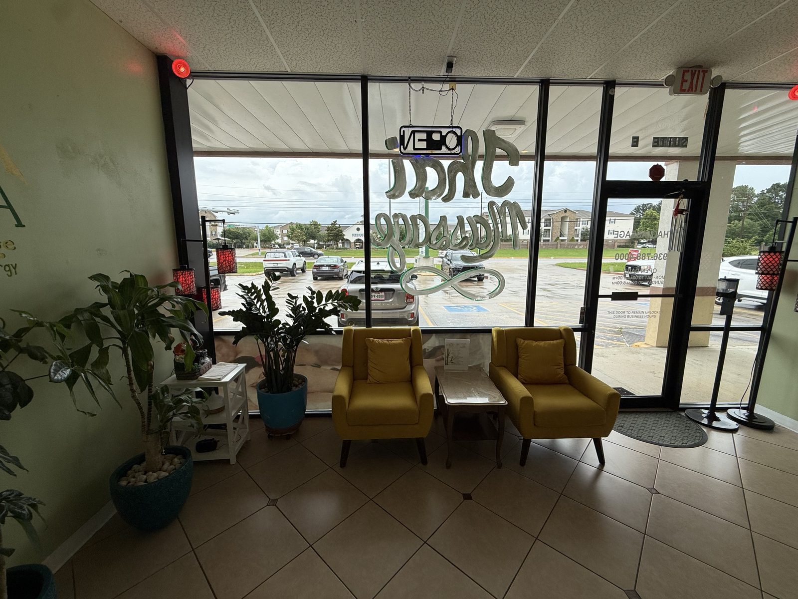 Bright waiting area at Magnolia Wellness Massage in Magnolia, TX